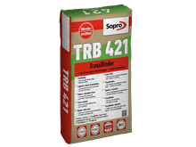 Een zak trass bindmiddel voor het leggen van tegels