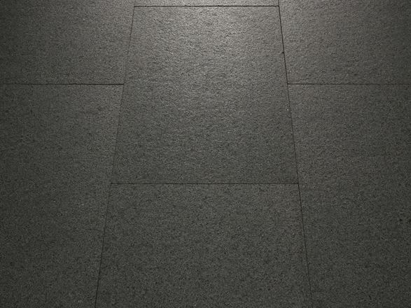 Close-up van gelegd Padang Dark graniet