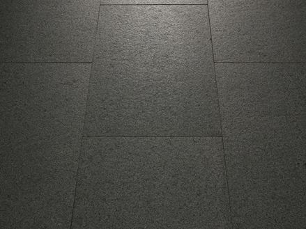 Close-up van gelegd Padang Dark graniet