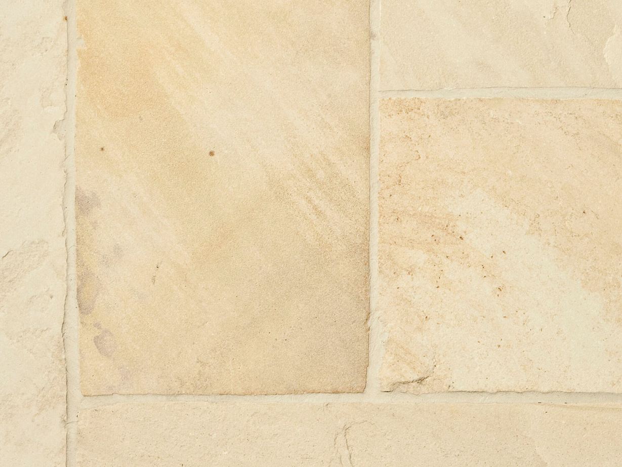 Close-up van platen gele muntzandsteen van bovenaf